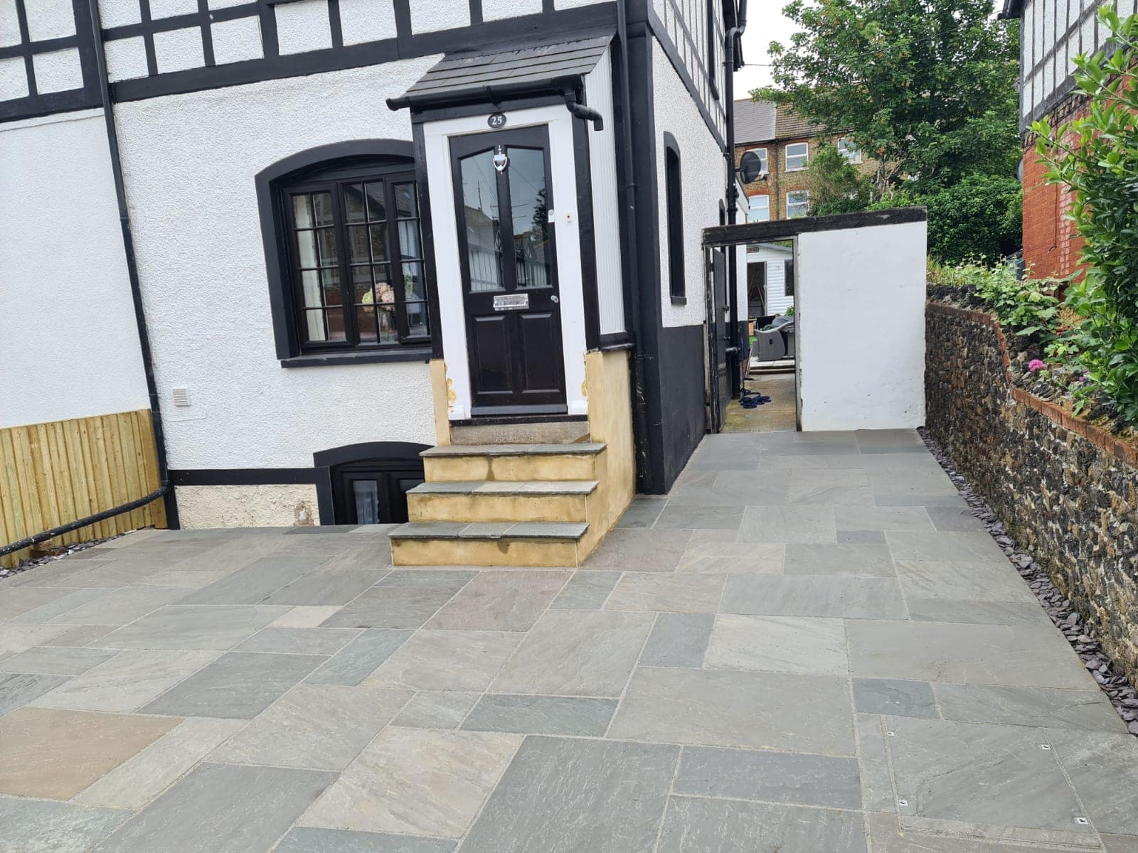 Grey stone paving with steps - Jackson Landscaping
